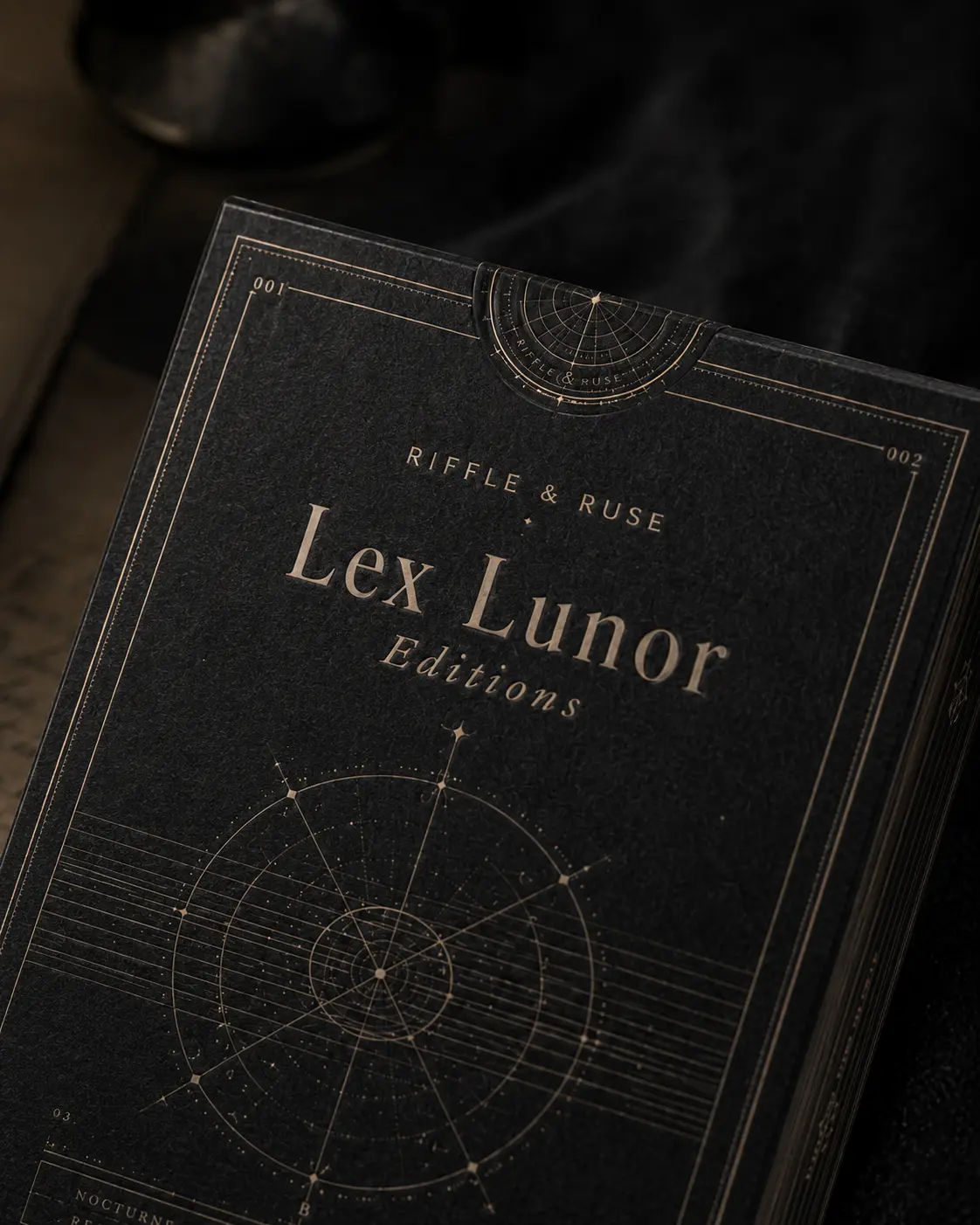 Close view of the Lex Lunor tuck case foil and printed geometry