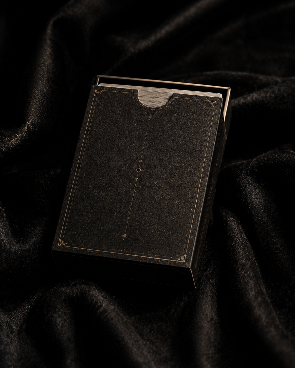 Dark textured tuck case resting on black cloth